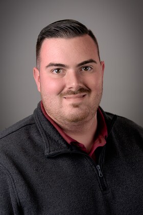 Staff member Aidan Foley from ID_5913211a5ff5