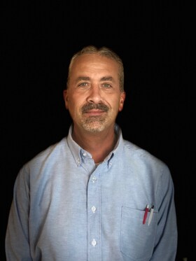 Staff member Joe Daniels from 496d46747cae