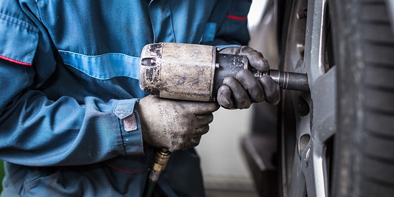 Toyota service technician performing tire service