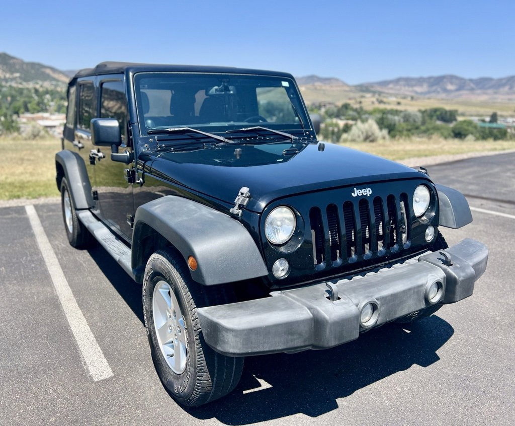 Used 2014 Jeep Wrangler Unlimited Sport with VIN 1C4HJWDG4EL288251 for sale in Meeker, CO