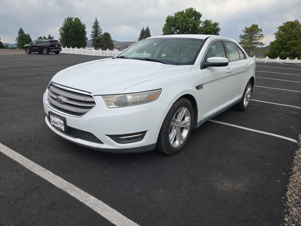 Used 2014 Ford Taurus SEL with VIN 1FAHP2E8XEG157791 for sale in Meeker, CO