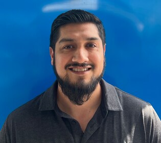 Staff member Jorge Marron from 119ce46a5783