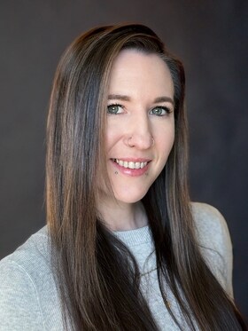 Staff member Sydney Ash from ID_916134