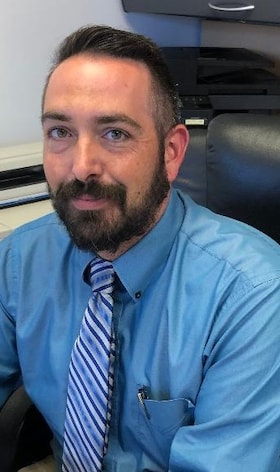 Staff member Mike Collins from 35f5a57efda4