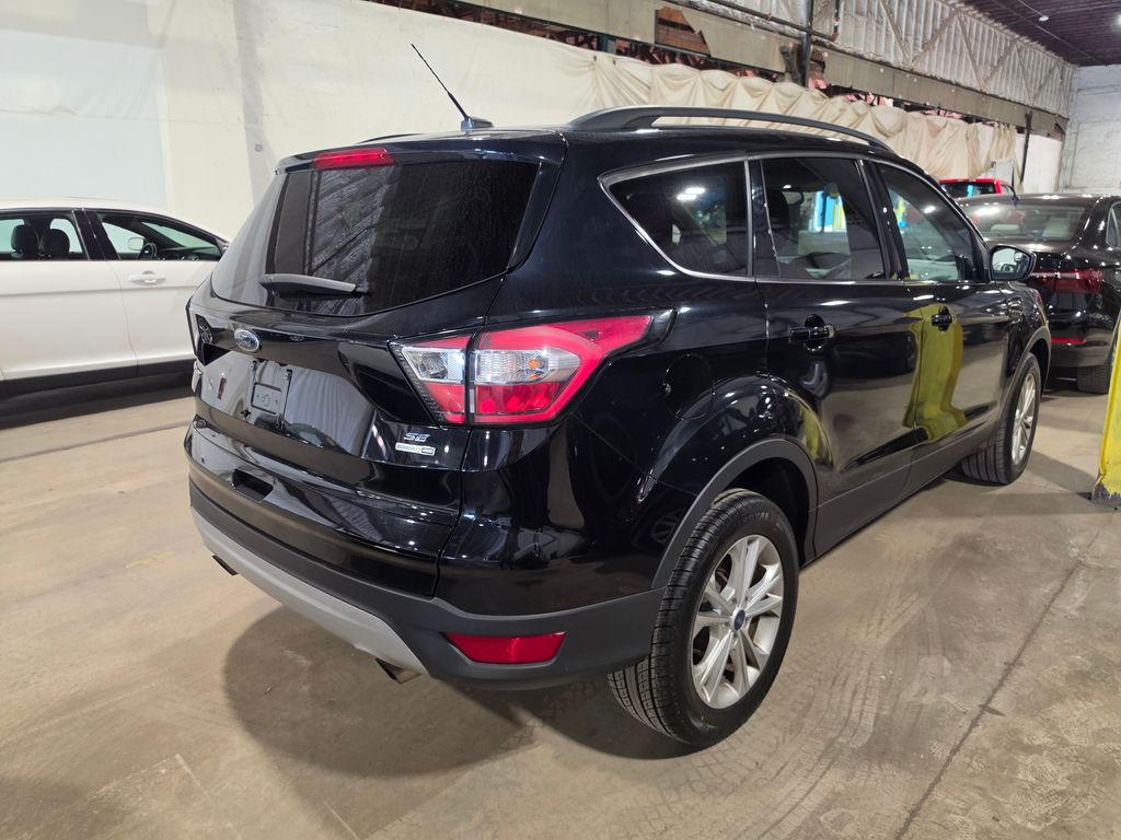 Used 2018 Ford Escape SE with VIN 1FMCU9GD6JUD08570 for sale in Chillicothe, OH