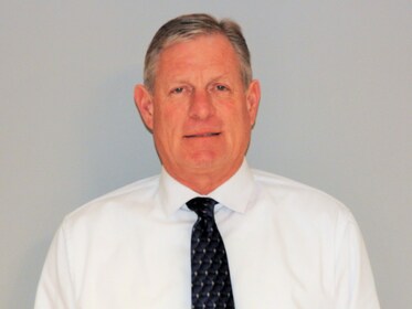 Staff member Joel Lambert from b820ae708ff6