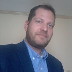 Staff member John Castellano from b820ae708ff6