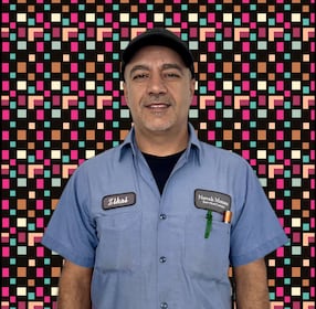 Staff member Zikri Tahir from 65b5fc2f519f