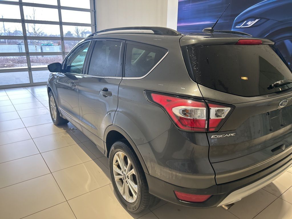 Used 2017 Ford Escape SE with VIN 1FMCU9GD4HUC62215 for sale in Buffalo, NY