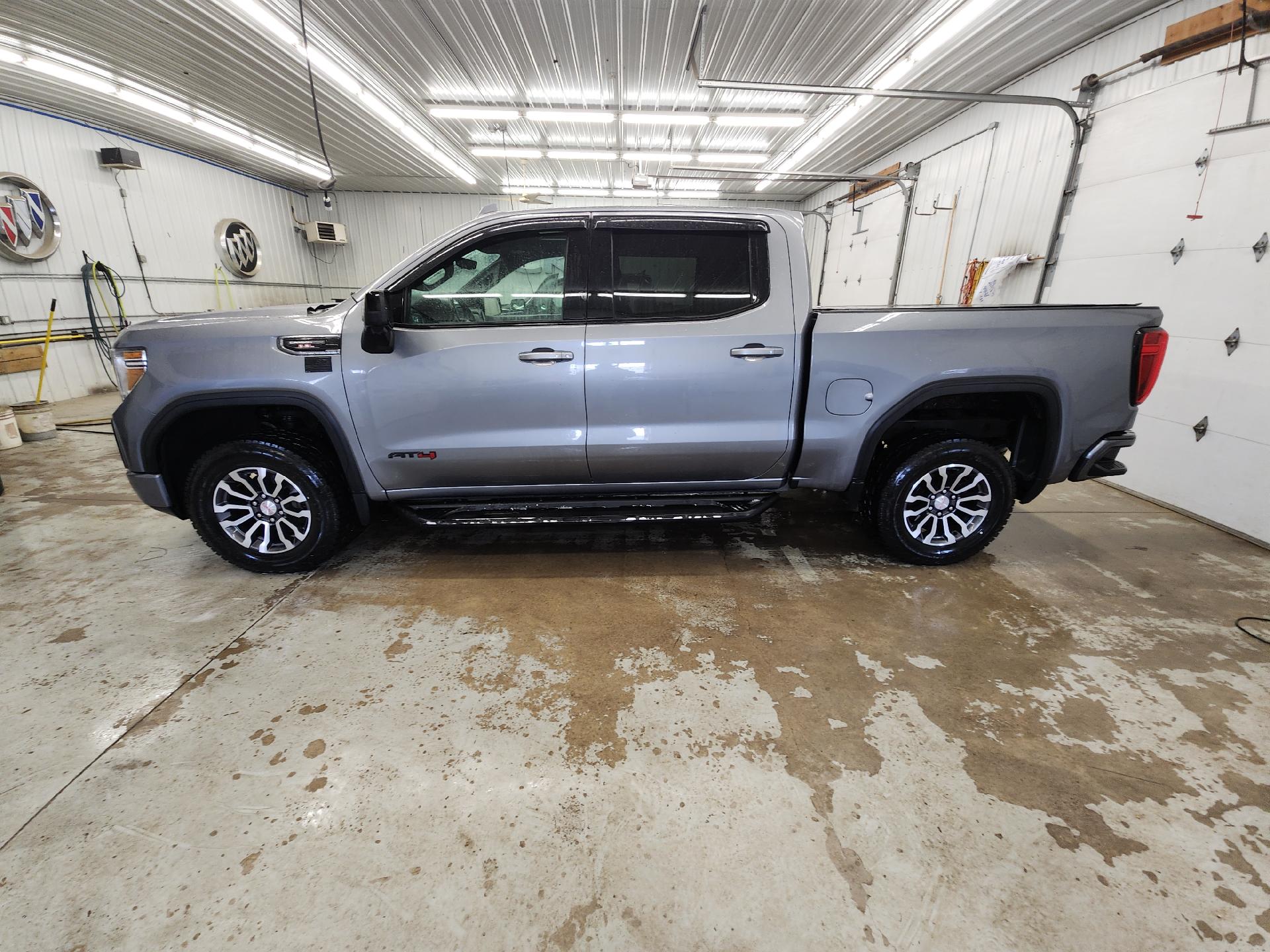 Used 2021 GMC Sierra 1500 AT4 with VIN 1GTP9EEL6MZ175214 for sale in Staples, Minnesota