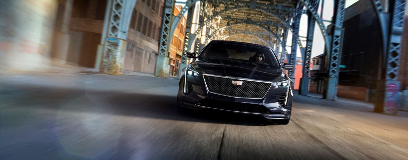 A black 2019 Cadillac CT6 V-Sport driving in a city