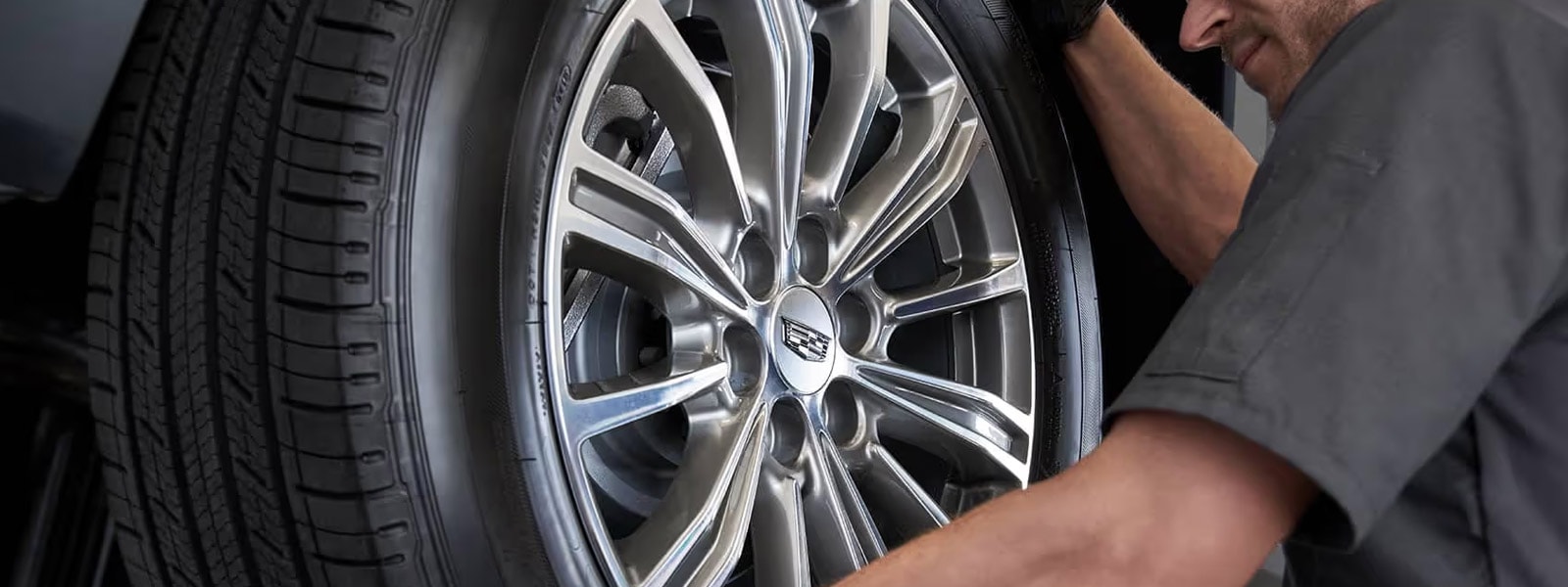 Tire rotation service on a Cadillac at Ocean Cadillac in Miami