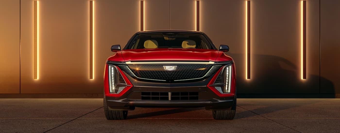 Front of a red 2025 Cadillac LYRIQ for sale near Hialeah parked at a dealership