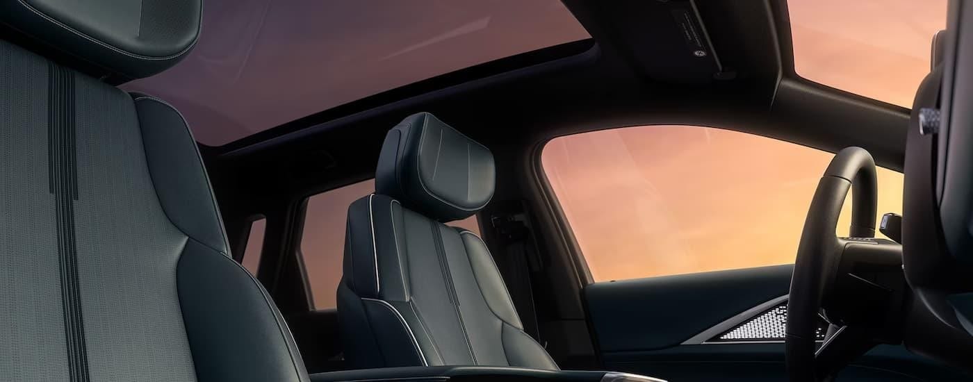 Grey front seats and sunroof in a 2025 Cadillac LYRIQ