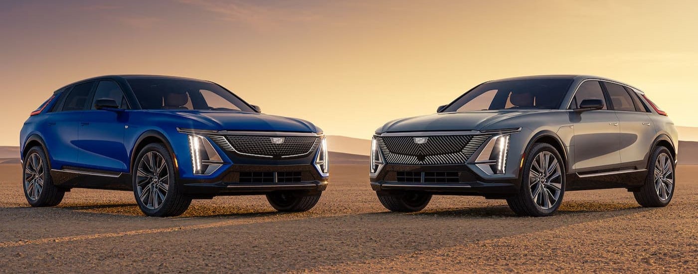 A blue and a silver 2026 Cadillac LYRIQ side by side.