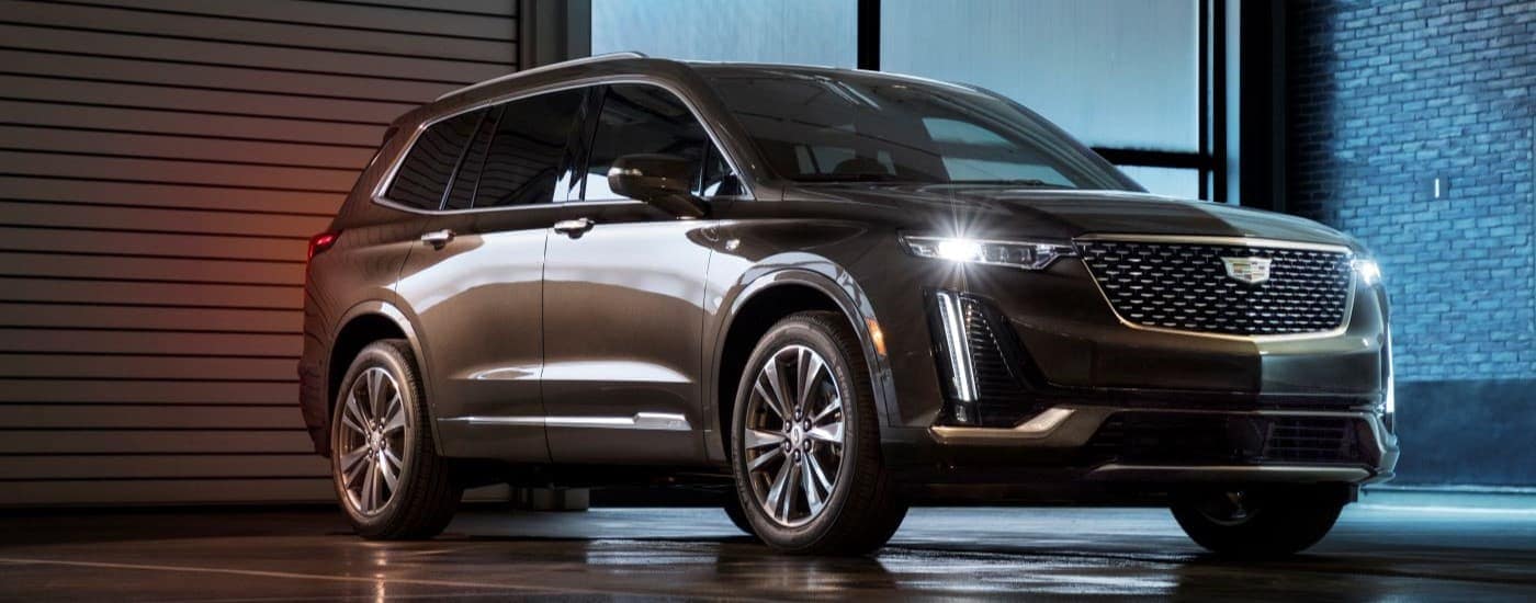 Brown 2025 Cadillac XT6 parked inside
