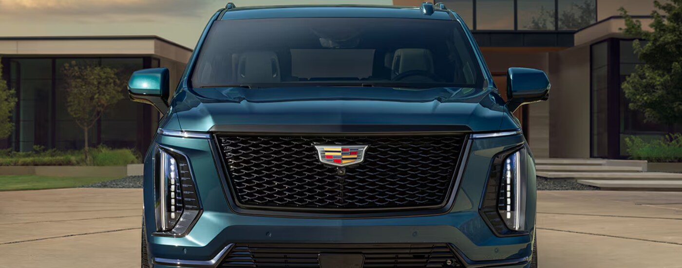 Close up of the black grille on a blue 2026 Cadillac Escalde