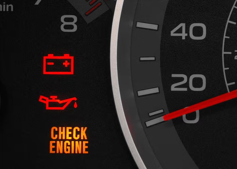 Check engine light illuminated on a vehicle instrument cluster