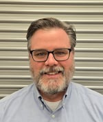 Staff member Scott Walker from ID_b3b8a3