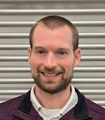 Staff member Ryan Booker from ID_b3b8a3