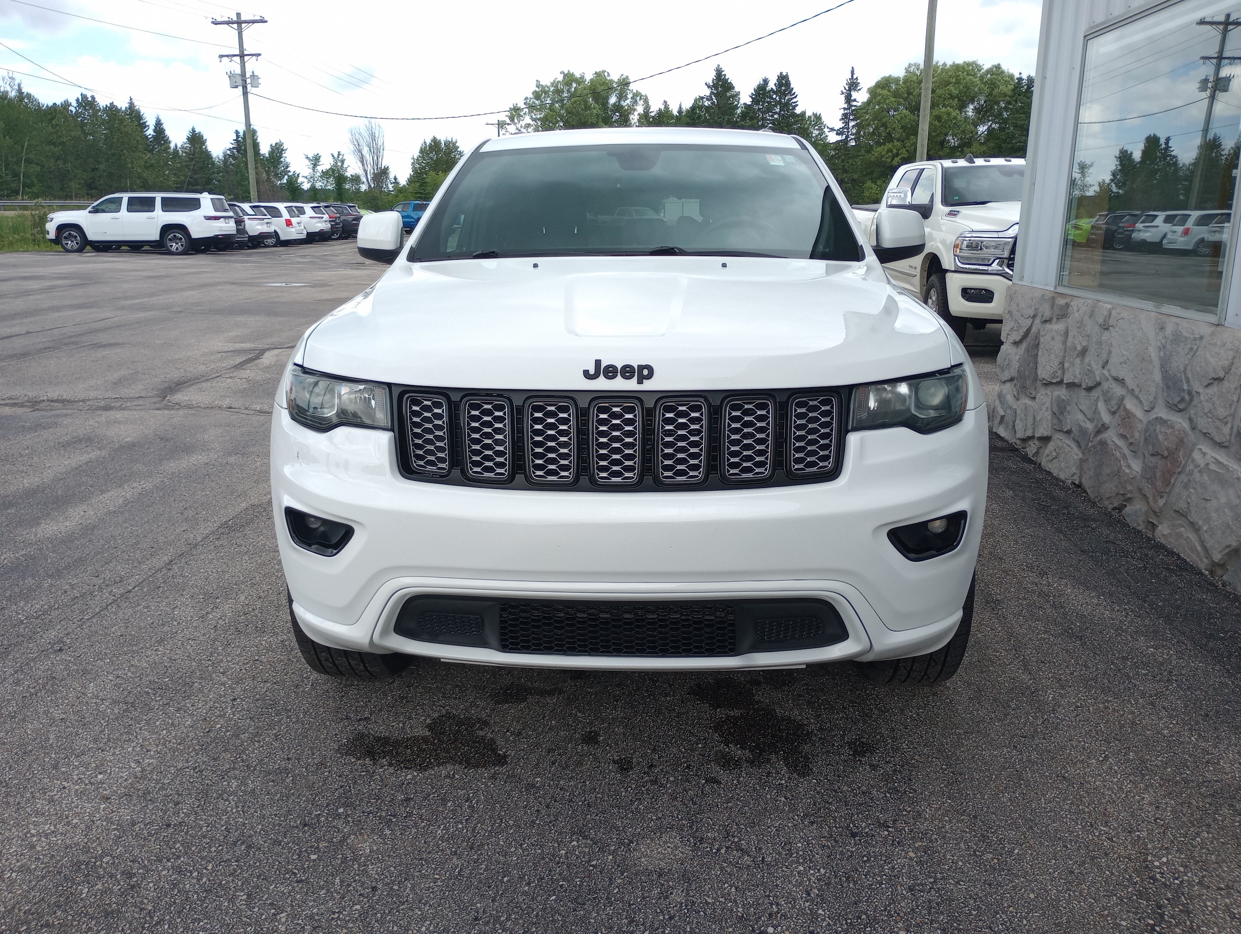 Used 2018 Jeep Grand Cherokee Altitude with VIN 1C4RJFAG3JC119535 for sale in Pickford, MI
