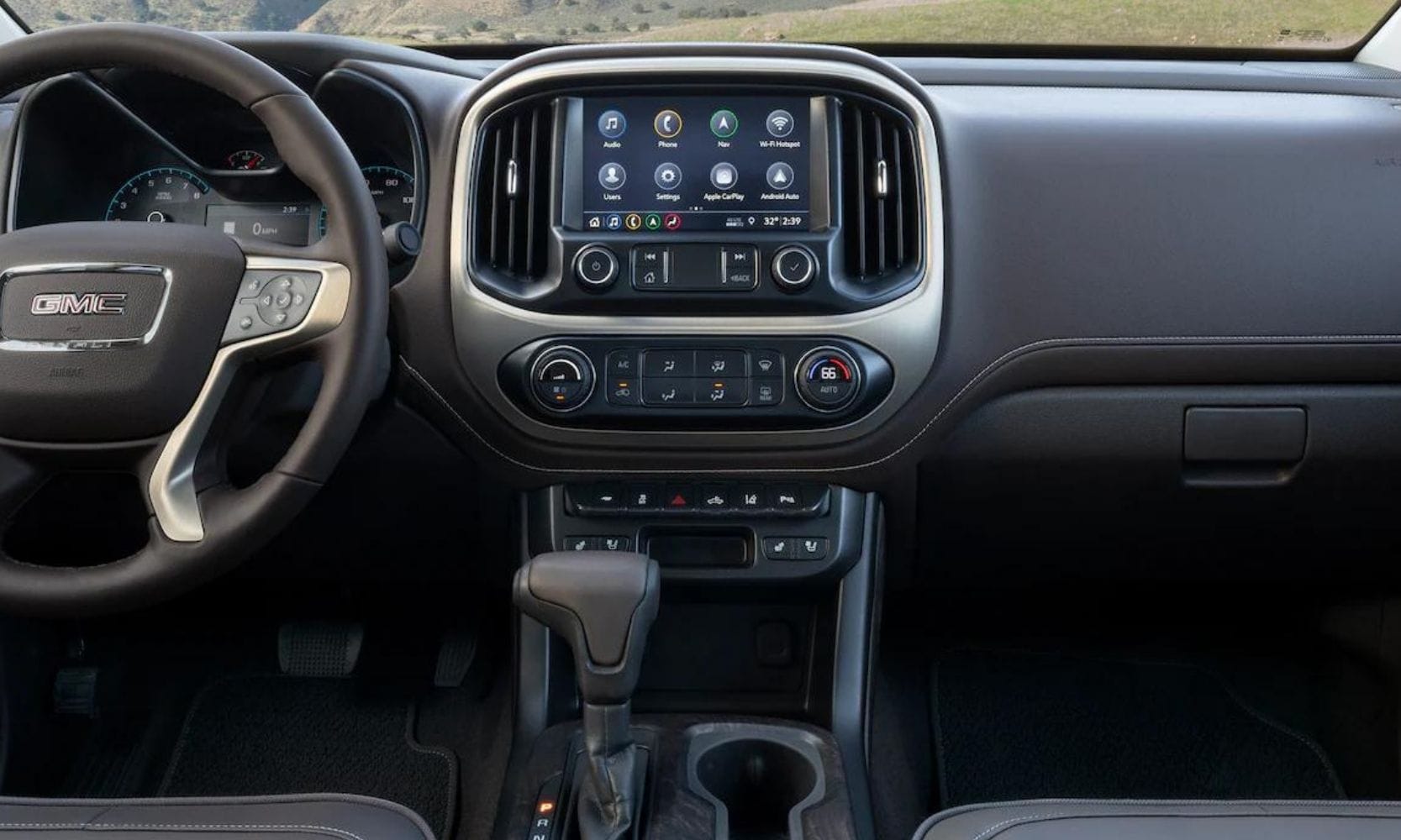 Front interior dashboard and instrument cluster inside the 2022 GMC Canyon truck