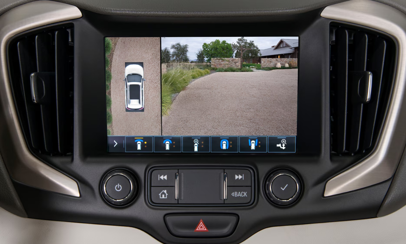 Close-up image of GMC's HD Surround vision camera system with vehicle and road views