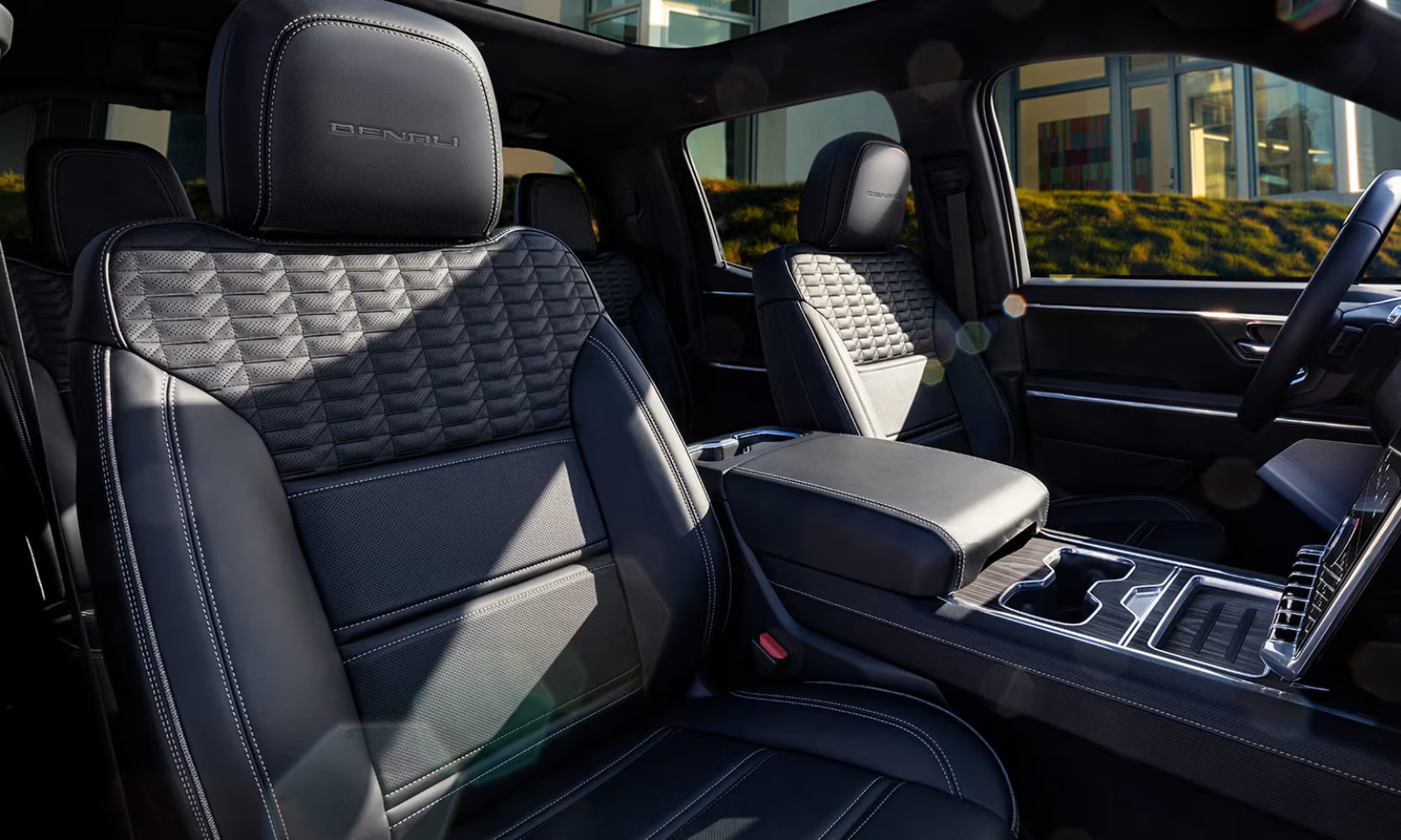 Interior image of the 2025 GMC Sierra EV two-row seating