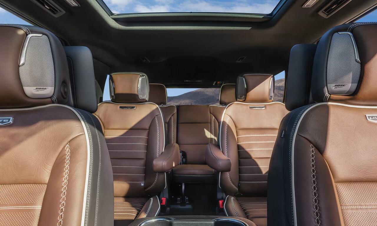 Interior image of the 2026 GMC Yukon three row tan leather seats
