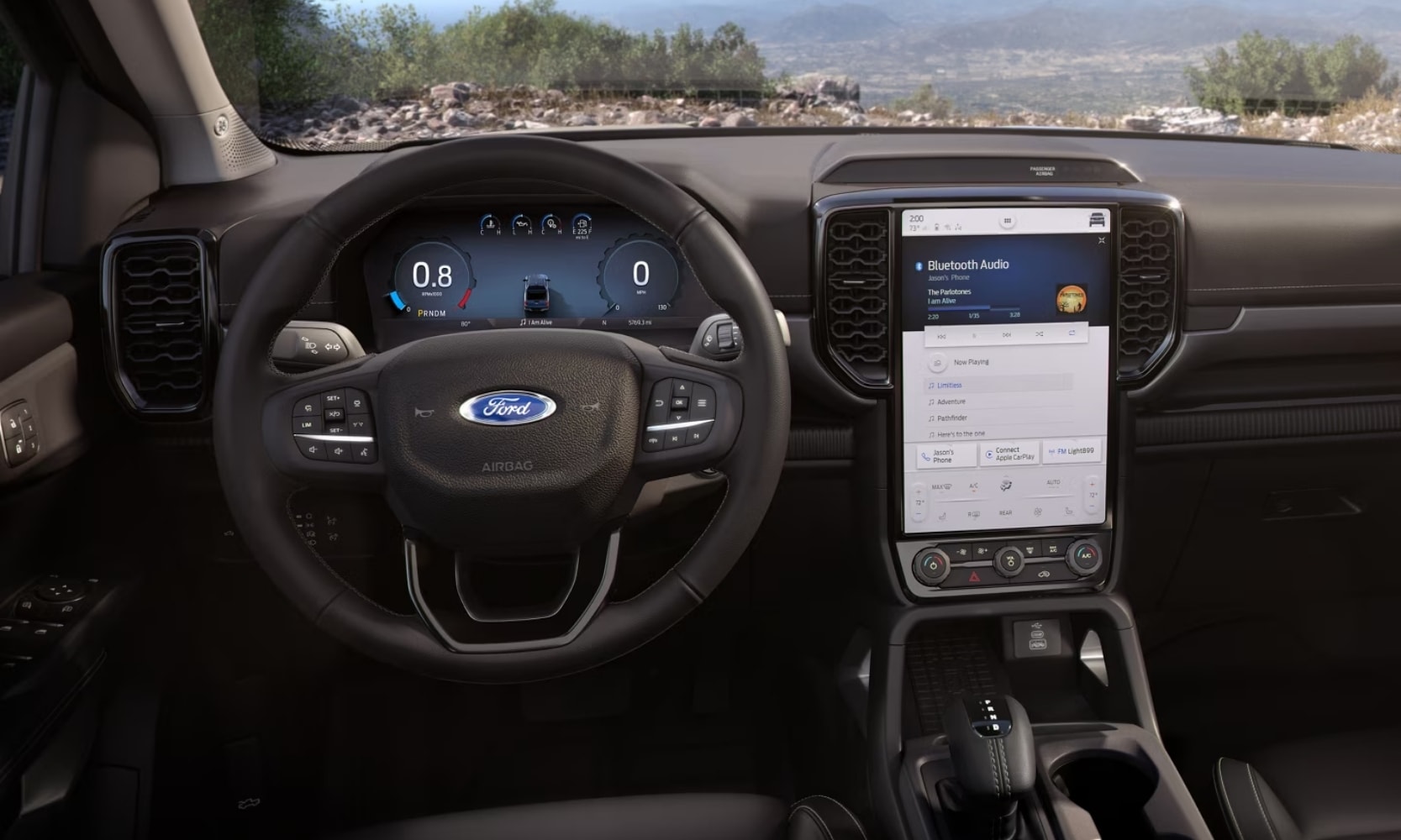 interior image of the 2024 Ford Ranger center stack console and steering wheel with mountain dashboard views