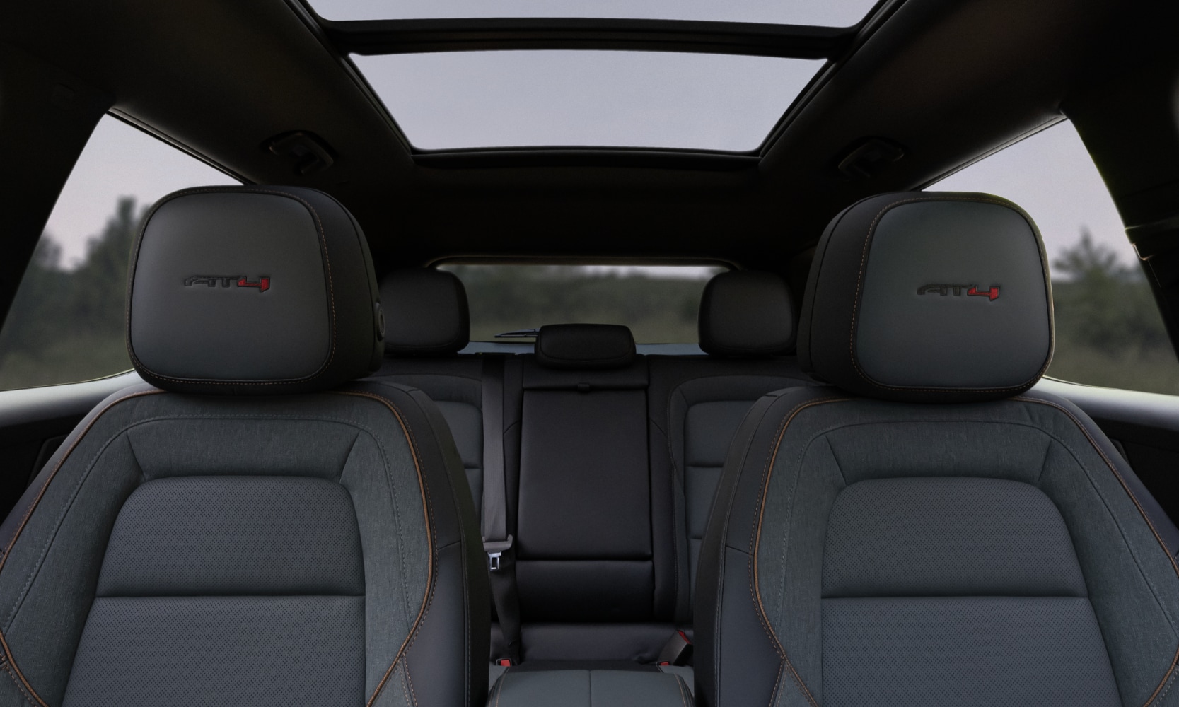 Interior image of a 2026 GMC Terrain AT4's two-row seats and sunroof