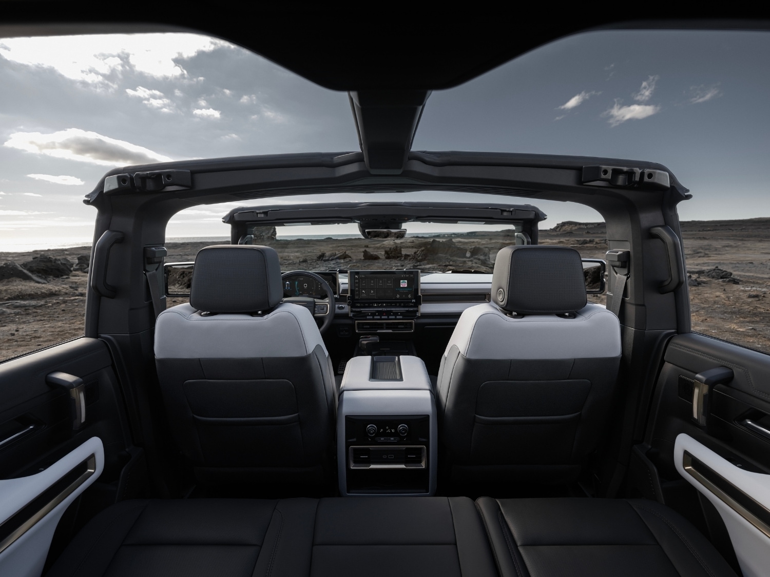 Rear interior seating and view of the inside of the 2025 GMC Hummer EV SUV