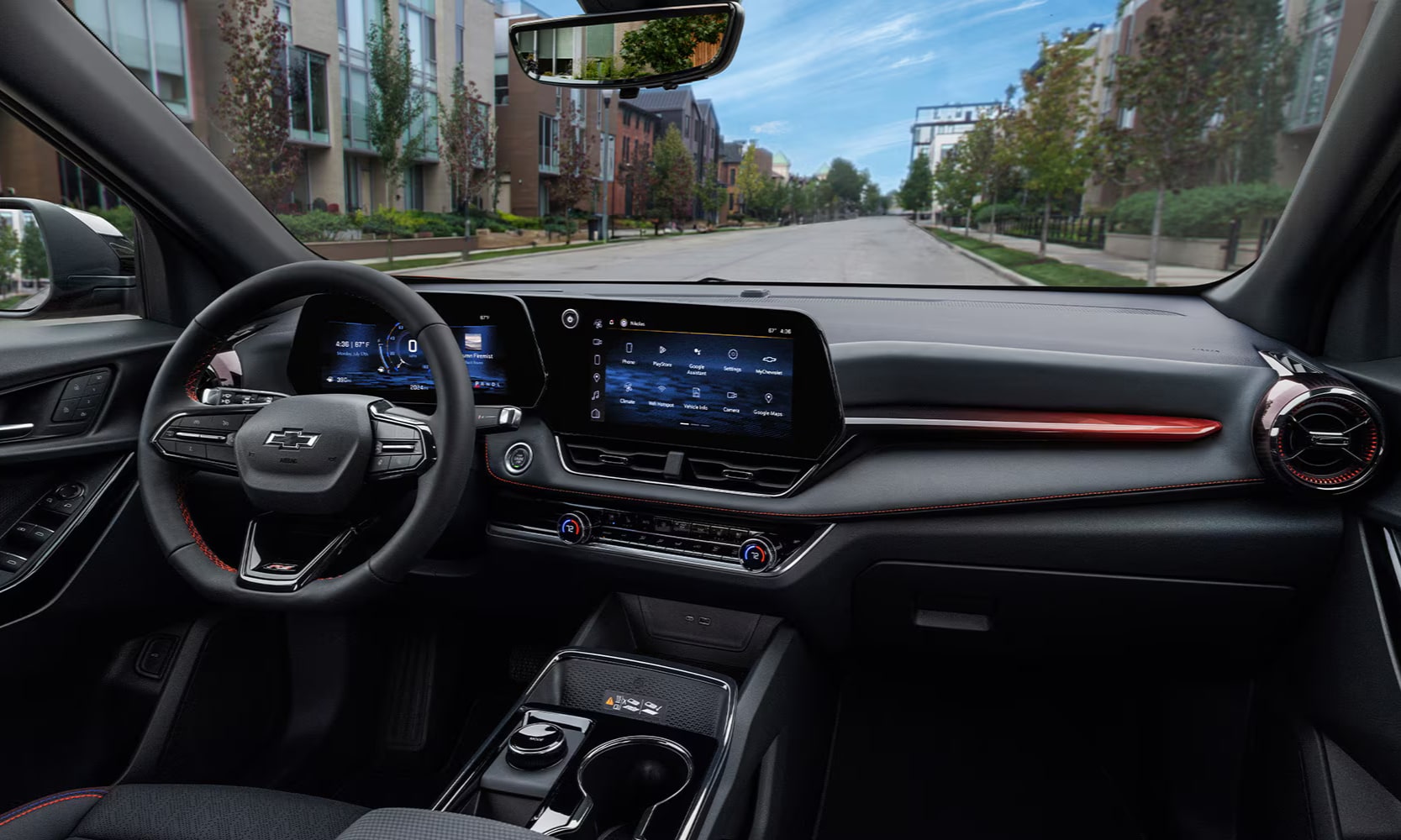 Interior image of a 2026 Chevrolet Equinox front seating area with suburban views in the windshield