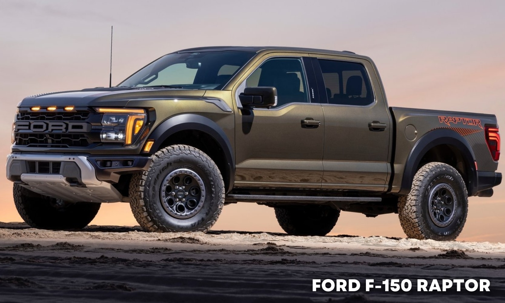 Image of an olive green 2025 Ford F-150 Raptor parked on a sandy terrain during sunset