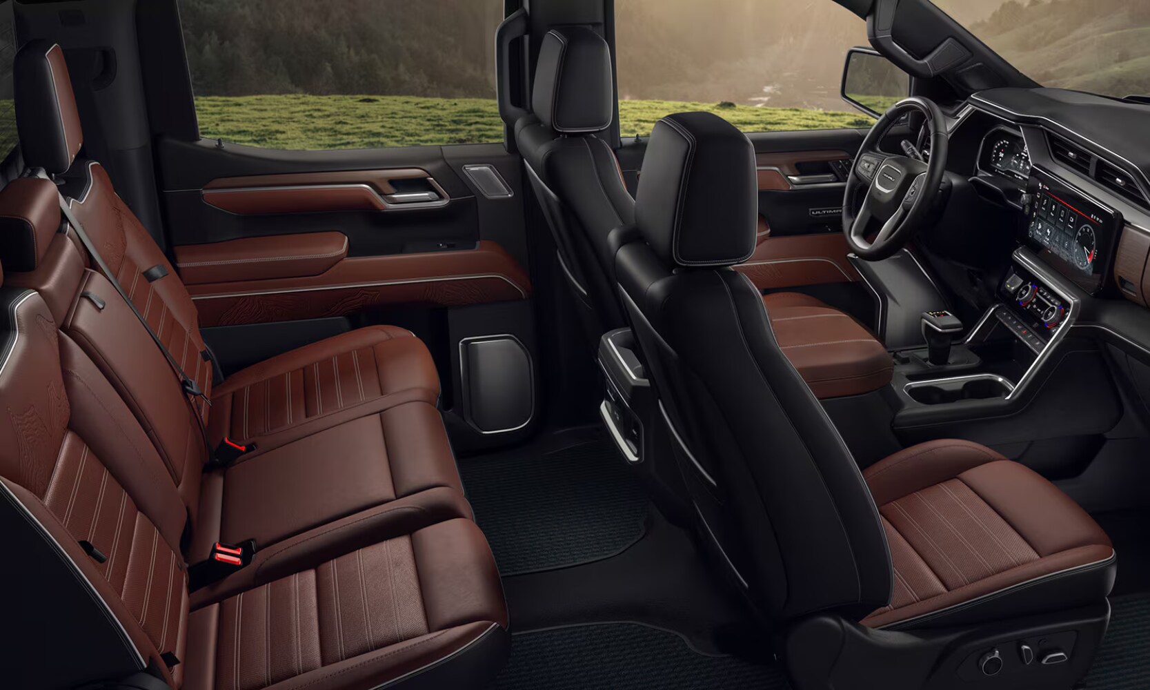 Top-view interior image of the 2025 GMC Sierra 1500 two-row brown and black seating