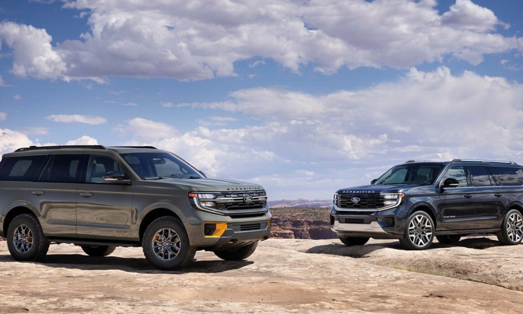 Side profile view of a 2025 Ford Expedition TREMOR on the left parked next to a 2025 Ford Expedition Platinum on the right