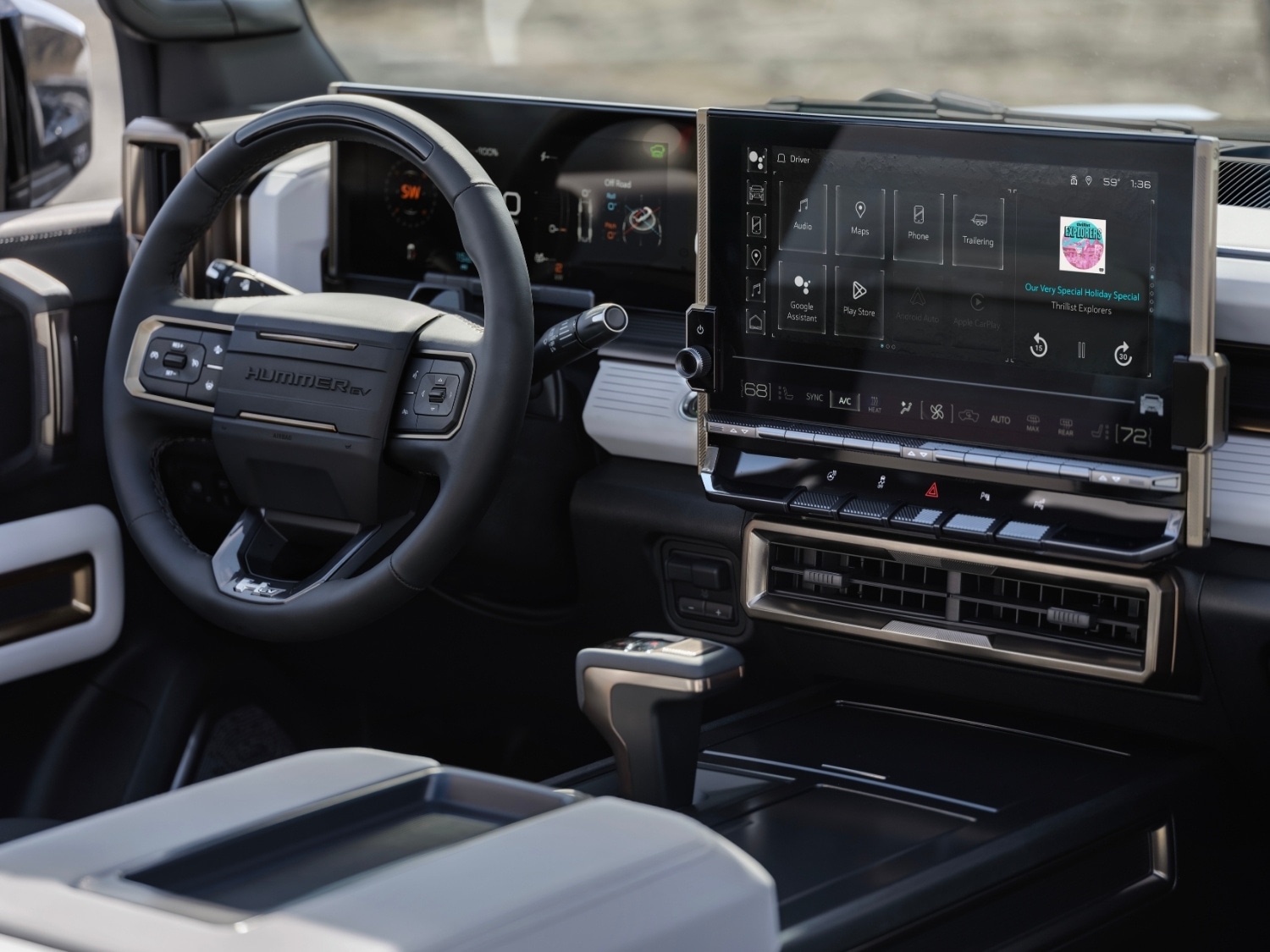 Front interior dashboard and infotainment touchscreen inside the 2025 GMC Hummer EV SUV