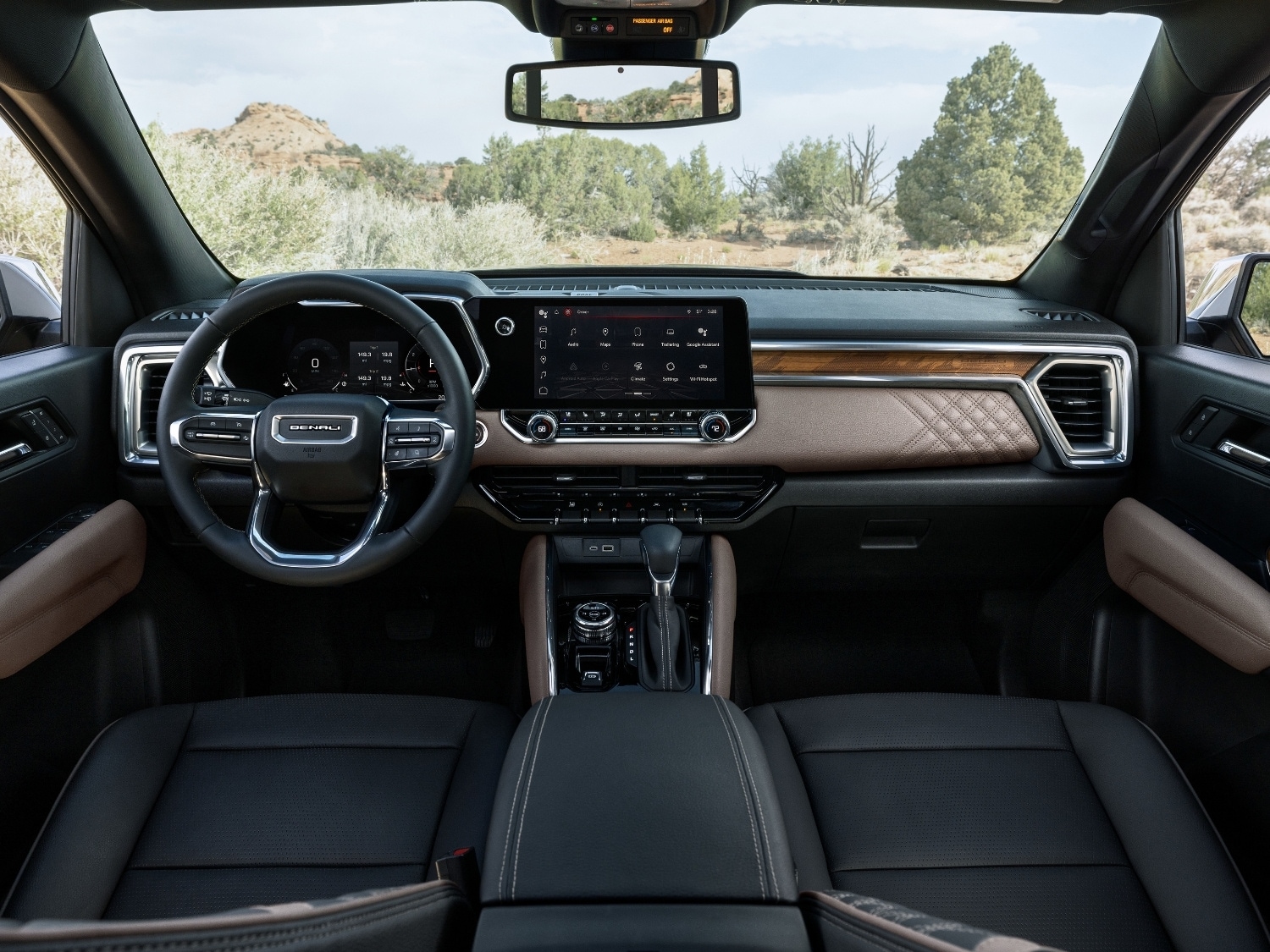 interior dashboard and front seating inside the 2025 GMC Canyon truck
