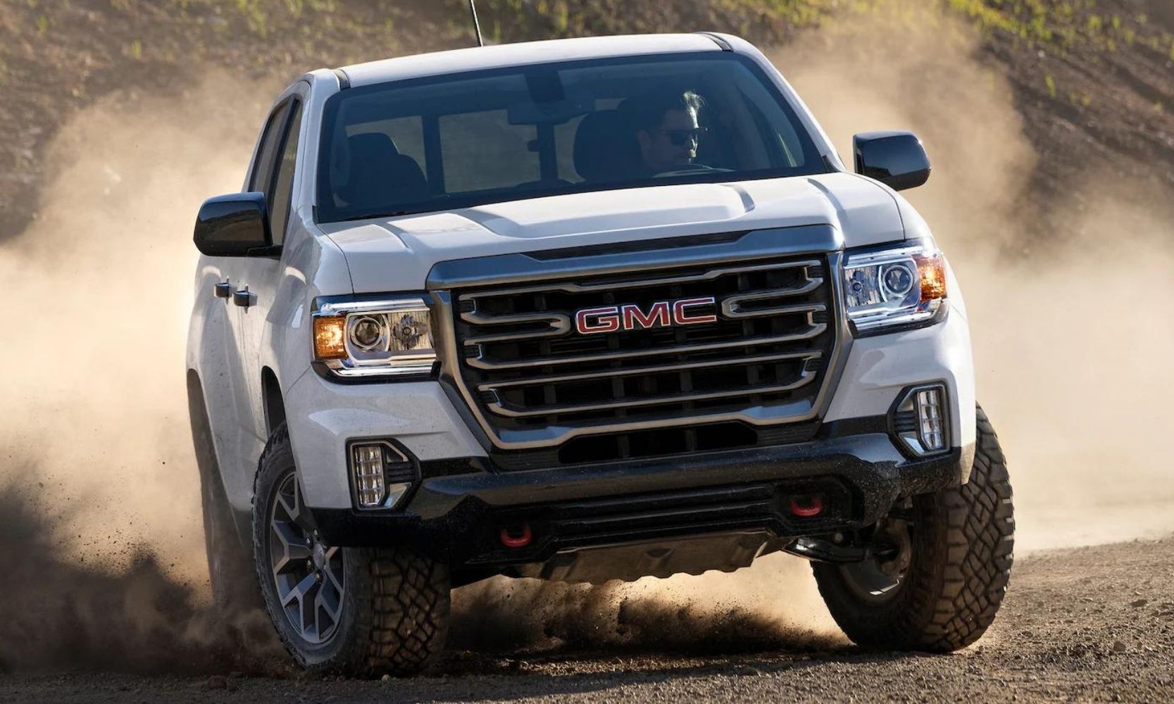 GMC Canyon AT4 trim on a dirt off-road trail