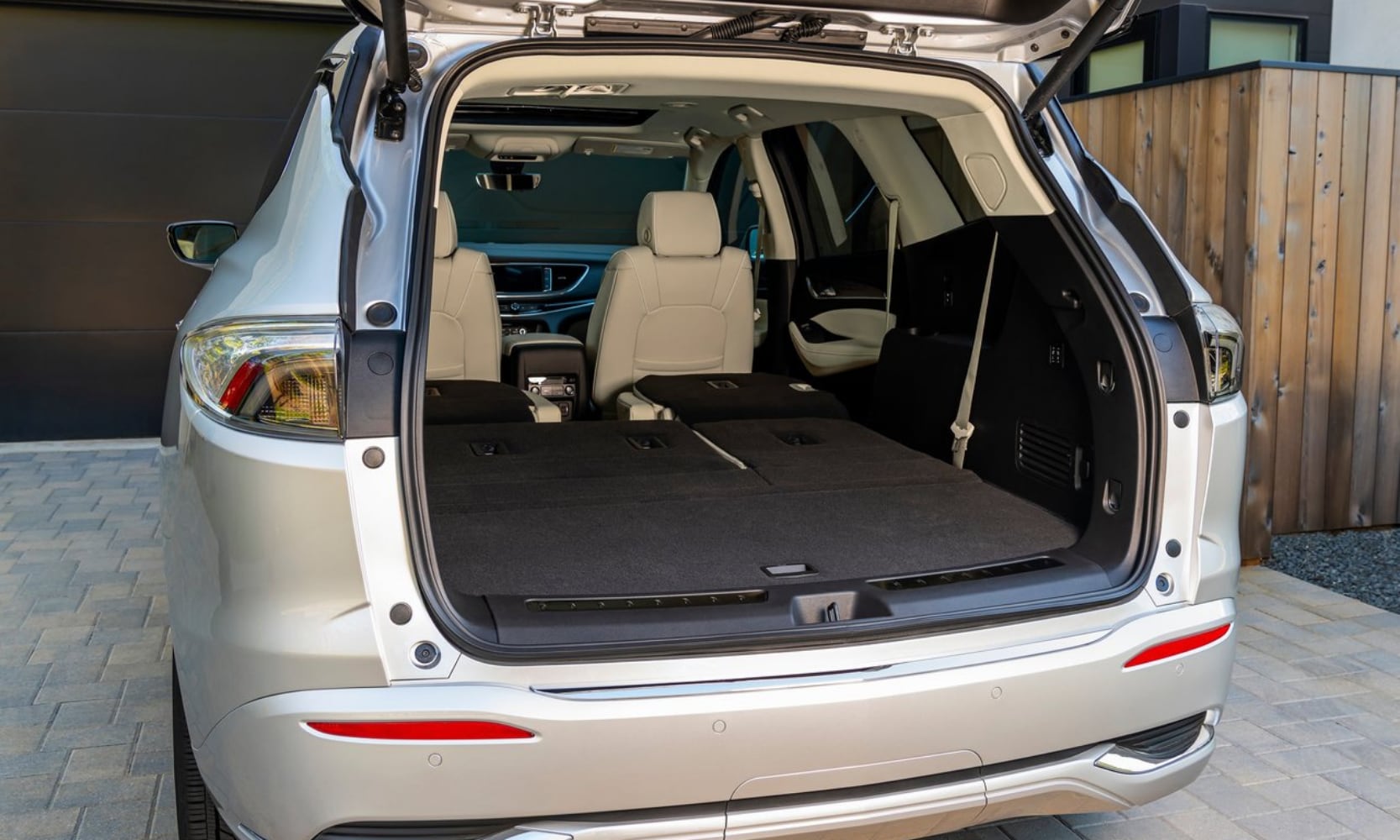 Rear interior cargo space area inside the 2022 Buick Enclave with all seating rows laid down