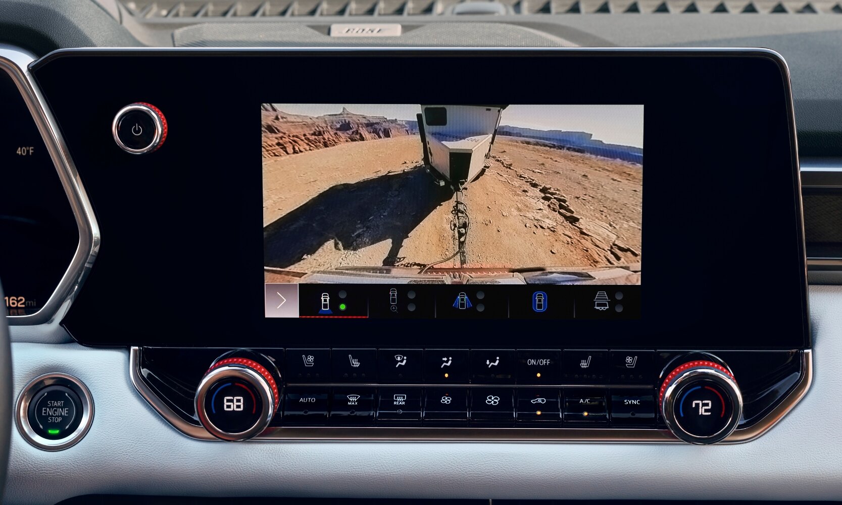 Close up view of the infotainment display showing the rear view camera trailer hitch capability for easy trailer towing hook-up