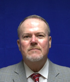 Staff member Chris Milam from ID_5551f7