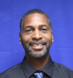Staff member Genesis Rhines from 7dc8b1908ec0