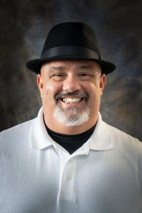 Staff member Mike Pocci from f0a4e969e18e