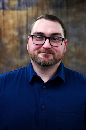 Staff member Cory McGlaughn from f0a4e969e18e