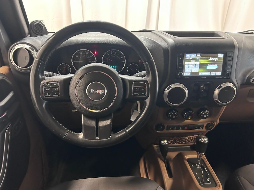 Used 2013 Jeep Wrangler Unlimited Sahara SUV