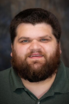 Staff member Caleb Pozorski from 5af3d6256f85