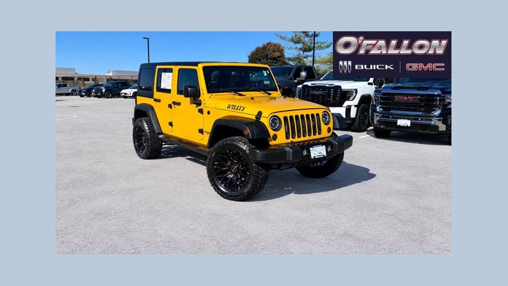 Used 2015 Jeep Wrangler Unlimited Sport with VIN 1C4BJWDG7FL662956 for sale in O'Fallon, MO