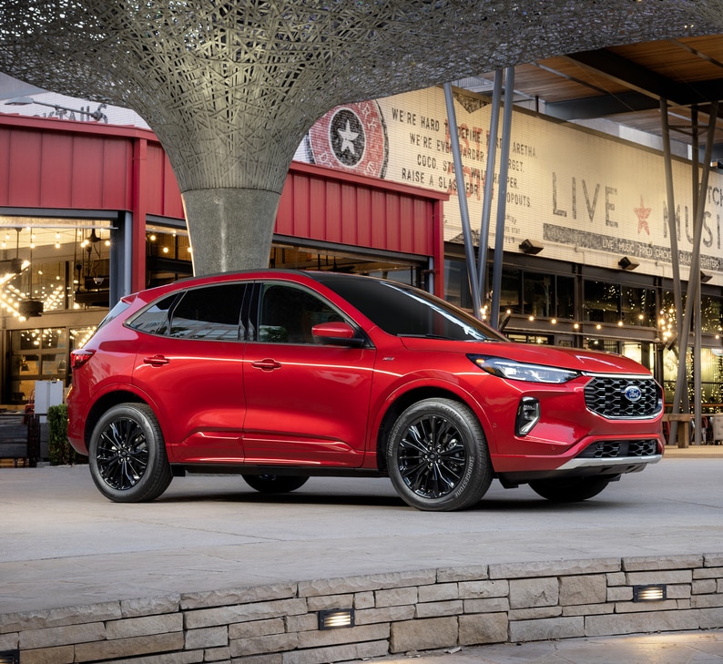 2024-Ford-Escape-STLine-SUV.png red Ford Escape parked in front of a music venue