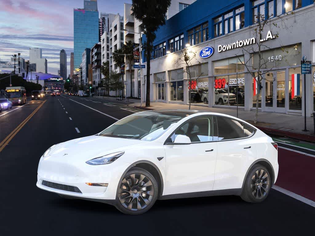 Used 2024 Tesla Model Y Long Range with VIN 7SAYGDED9RF087206 for sale in Los Angeles, CA